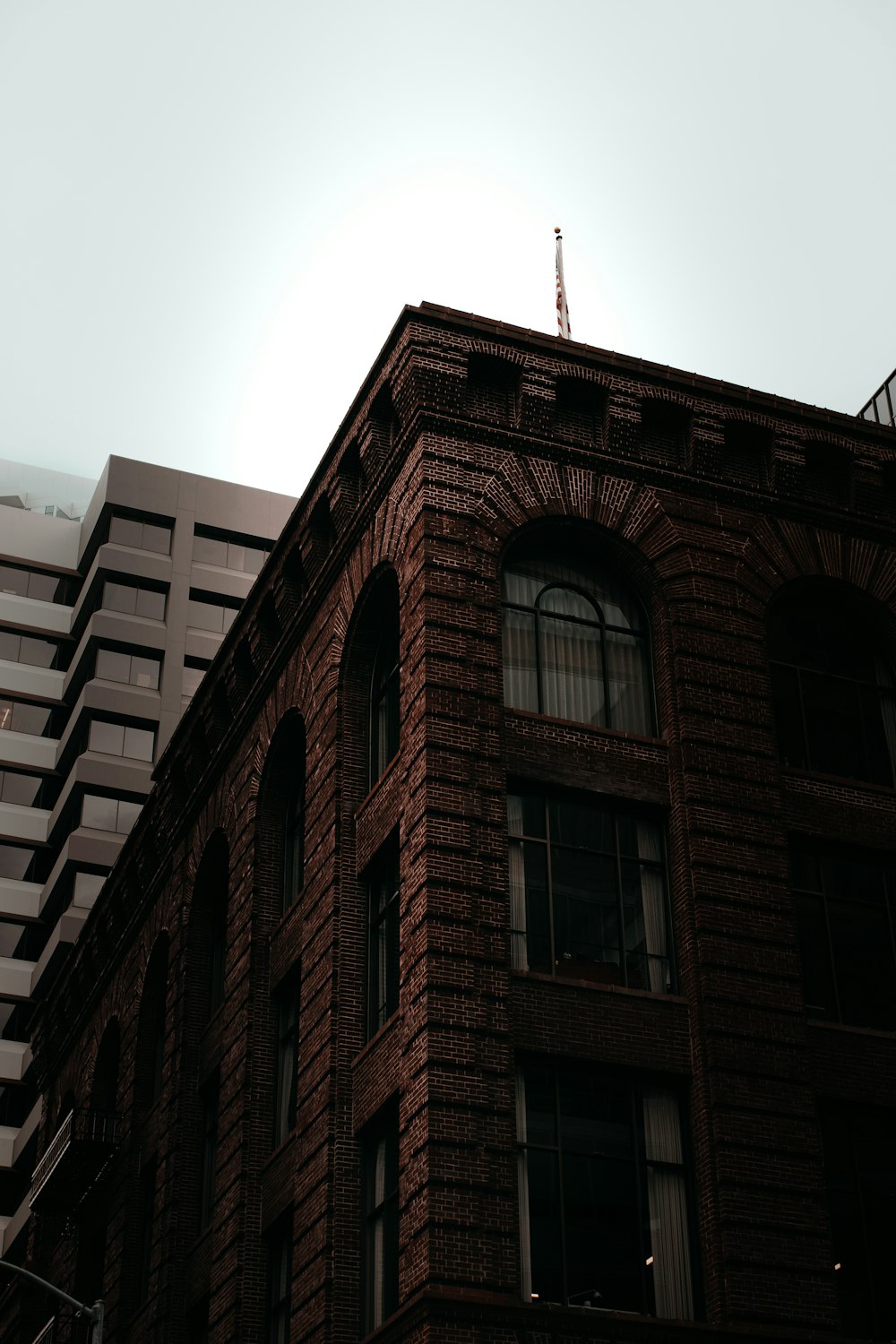 brown concrete building under blue sky during daytime