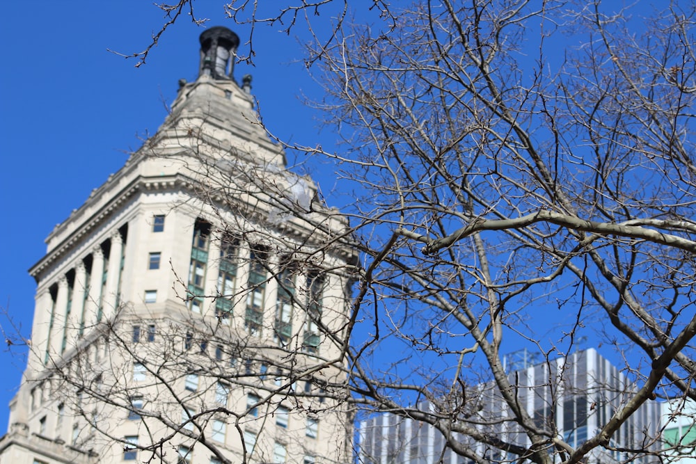 a tall building with a clock on the top of it