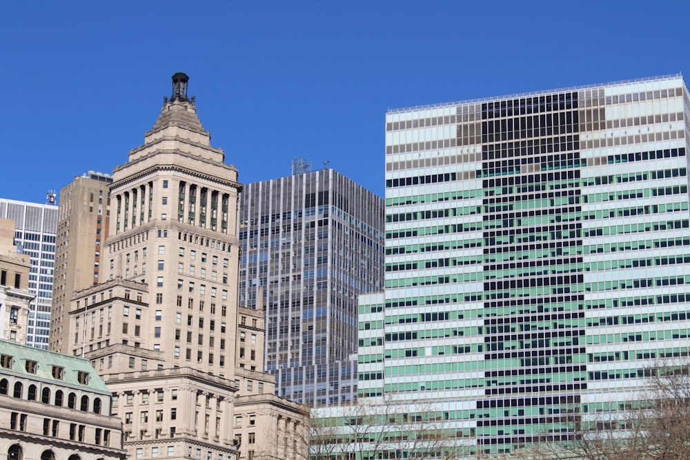 a group of tall buildings in a city