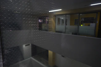 Before and after photos of a commercial office space cleaned after water leak.