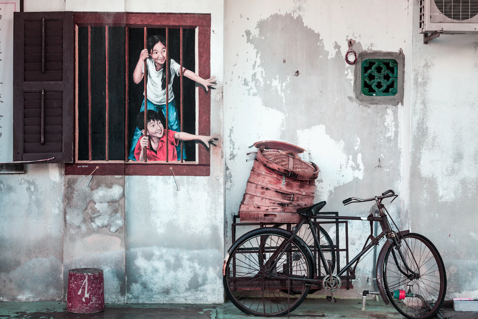 Street art and bicycle in George Town Penang Malaysia for a Malaysia eSIM travel article