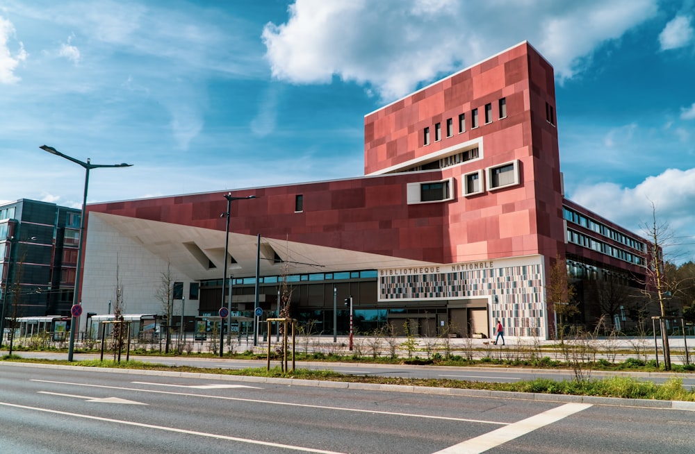 brown and white concrete building under blue sky during daytime