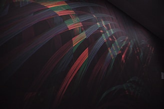 Abstract geometric data visualization with electric cyan and lime accents on a dark background.