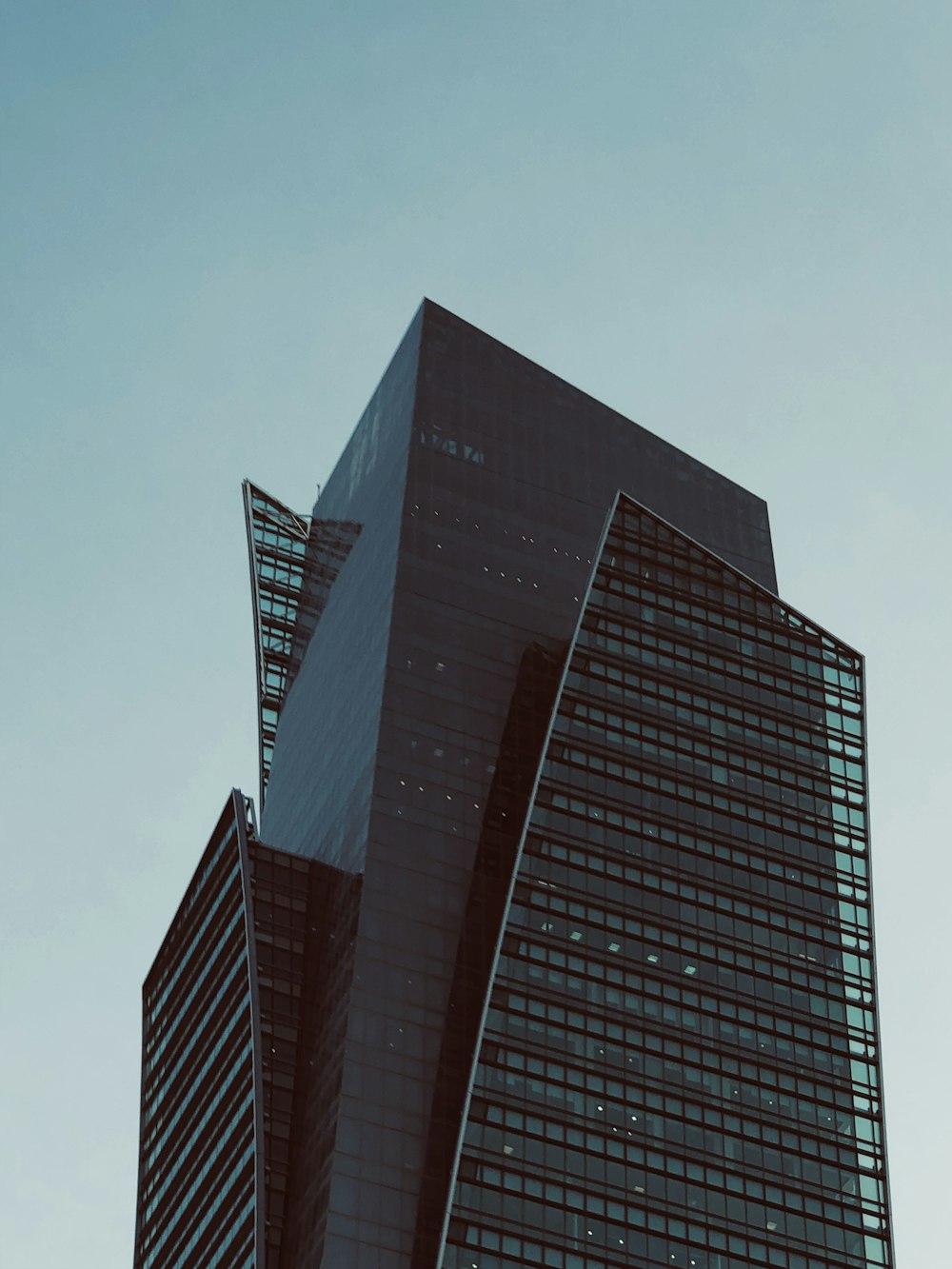 brown concrete building under blue sky during daytime