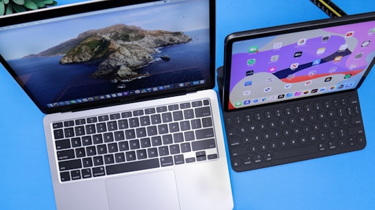 macbook pro beside ipad mini