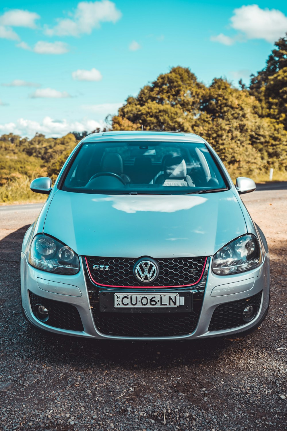 blue audi car on road during daytime