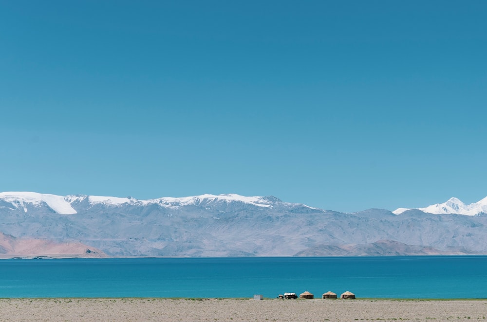 white and black mountains under blue sky during daytime