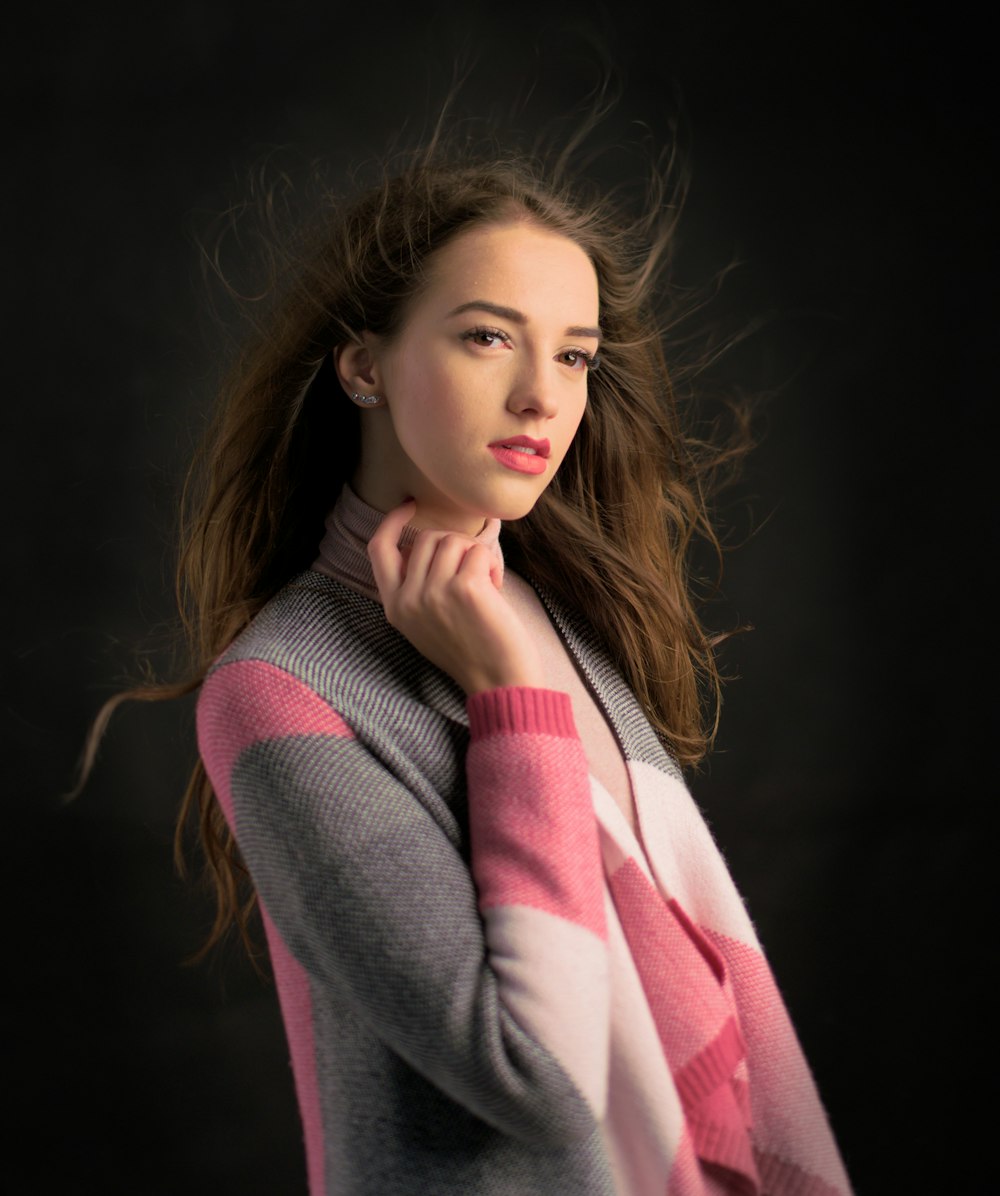 woman in pink and white scarf