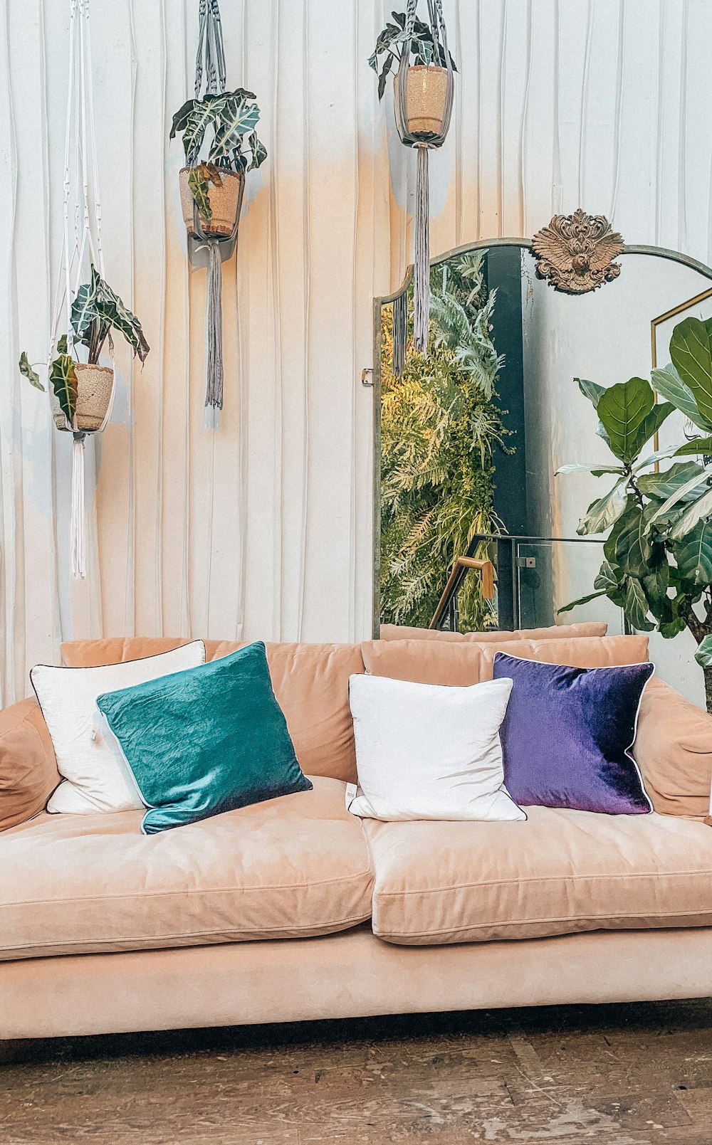 blue throw pillows on white couch