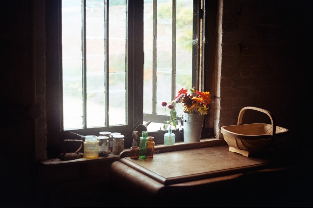 white ceramic bowl on brown wooden table