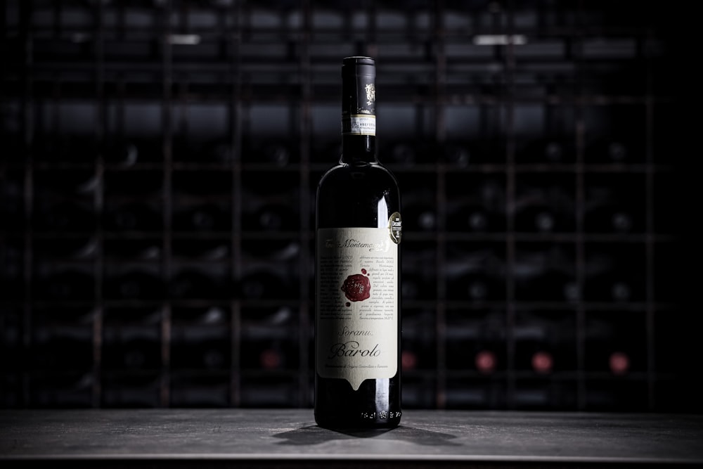 white labeled bottle on brown wooden table