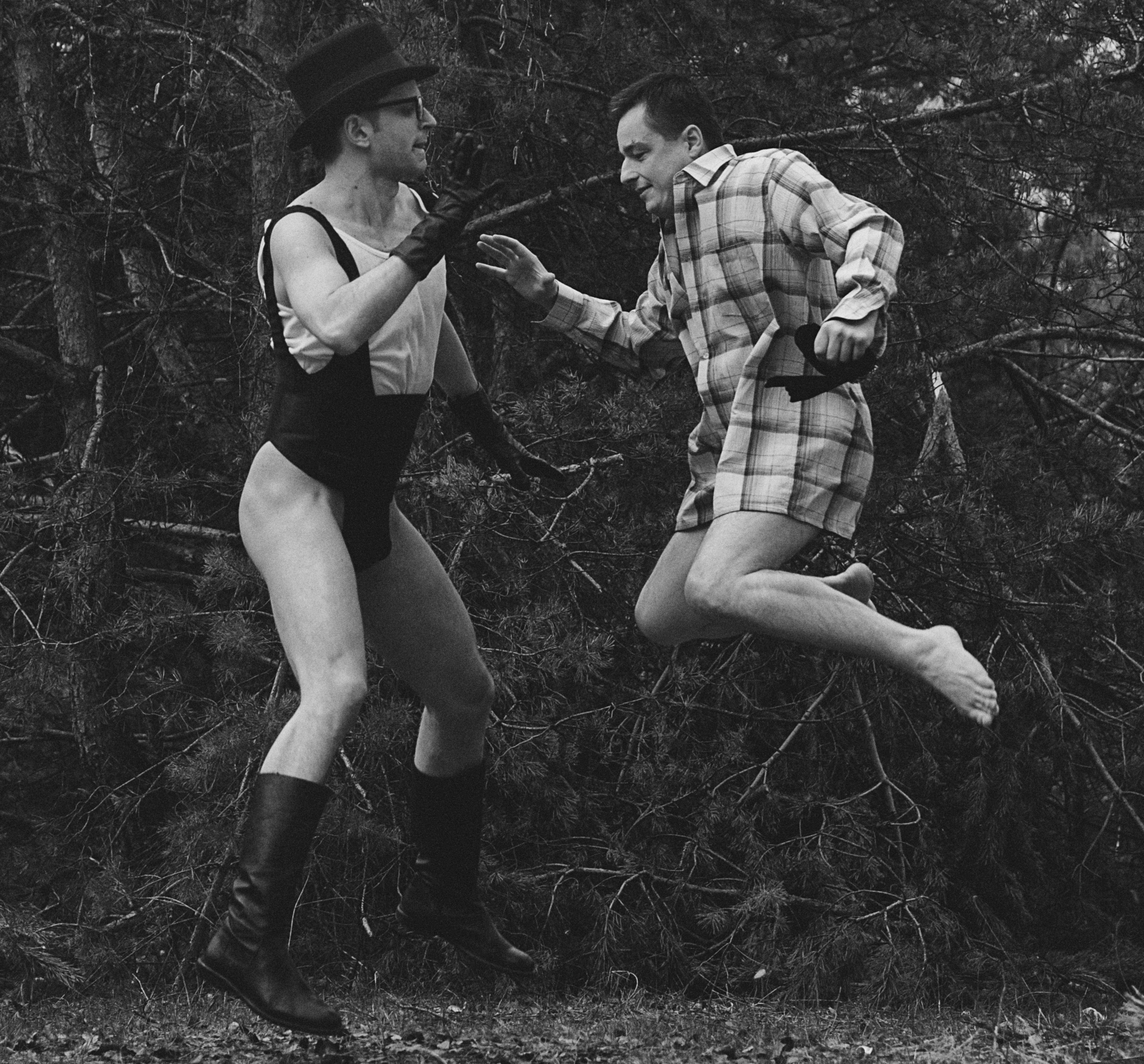 man and woman kissing on the ground