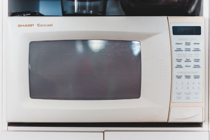 white microwave oven turned off