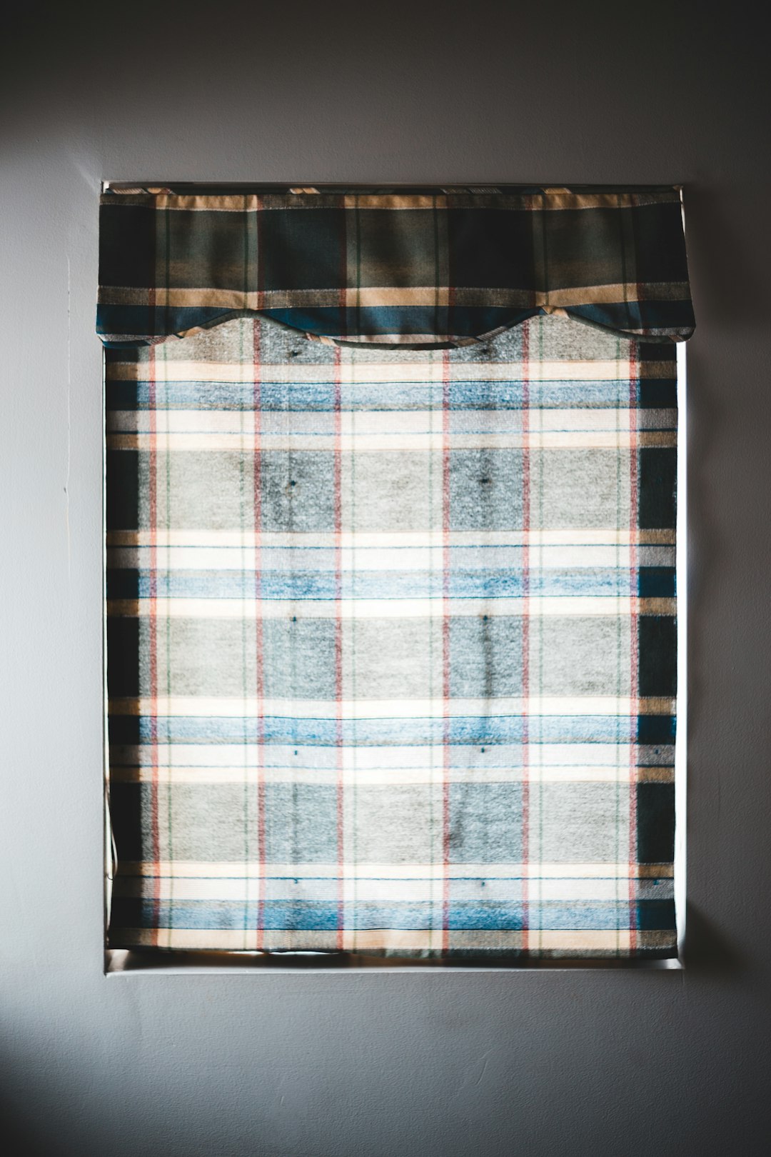 blue and white plaid textile