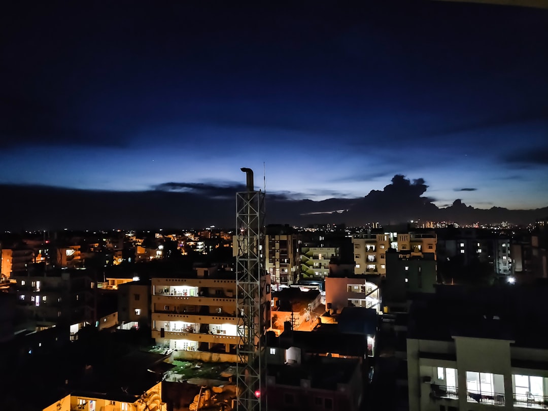 city with high rise buildings during night time