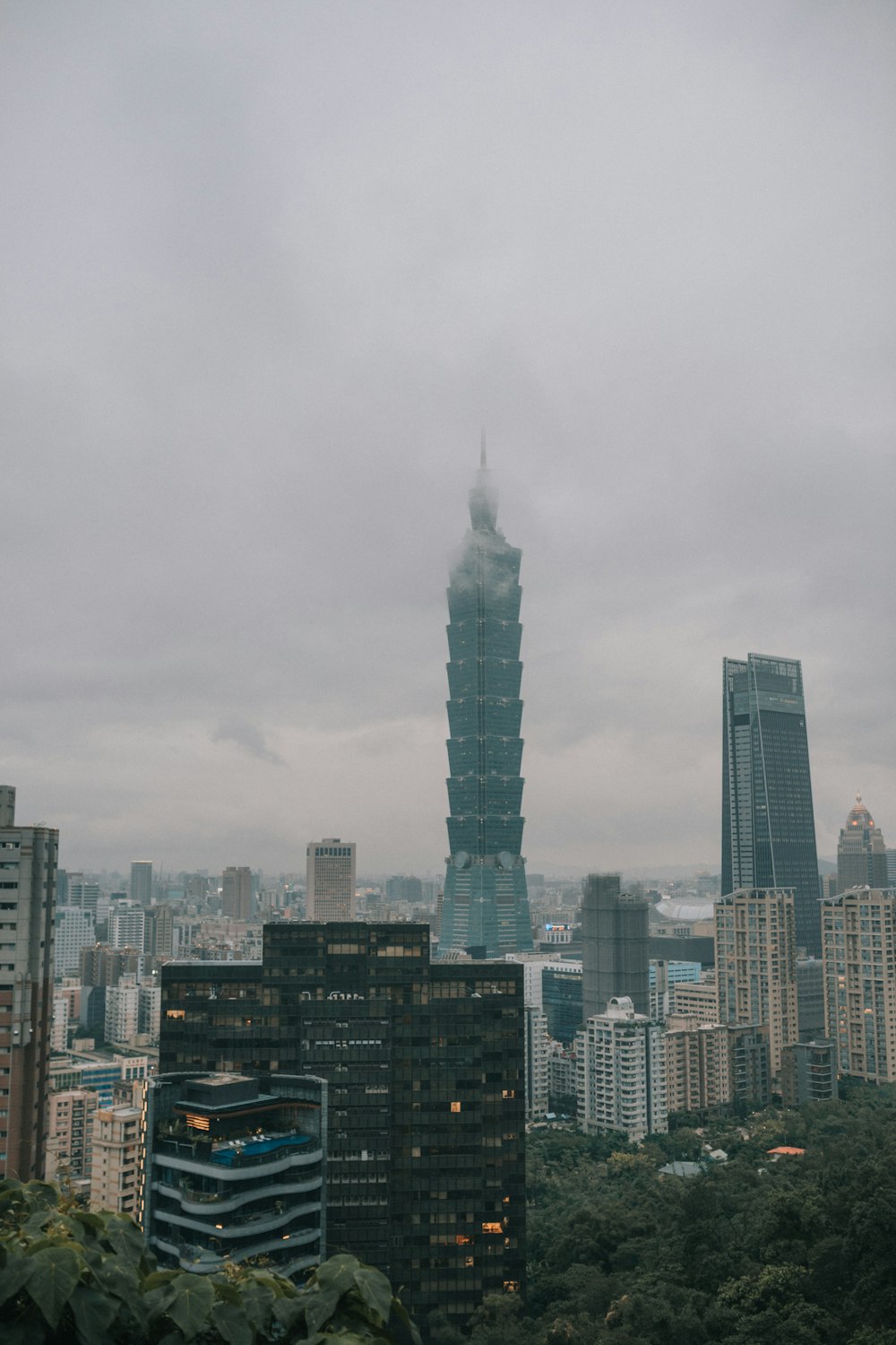 city skyline under gray sky during daytime