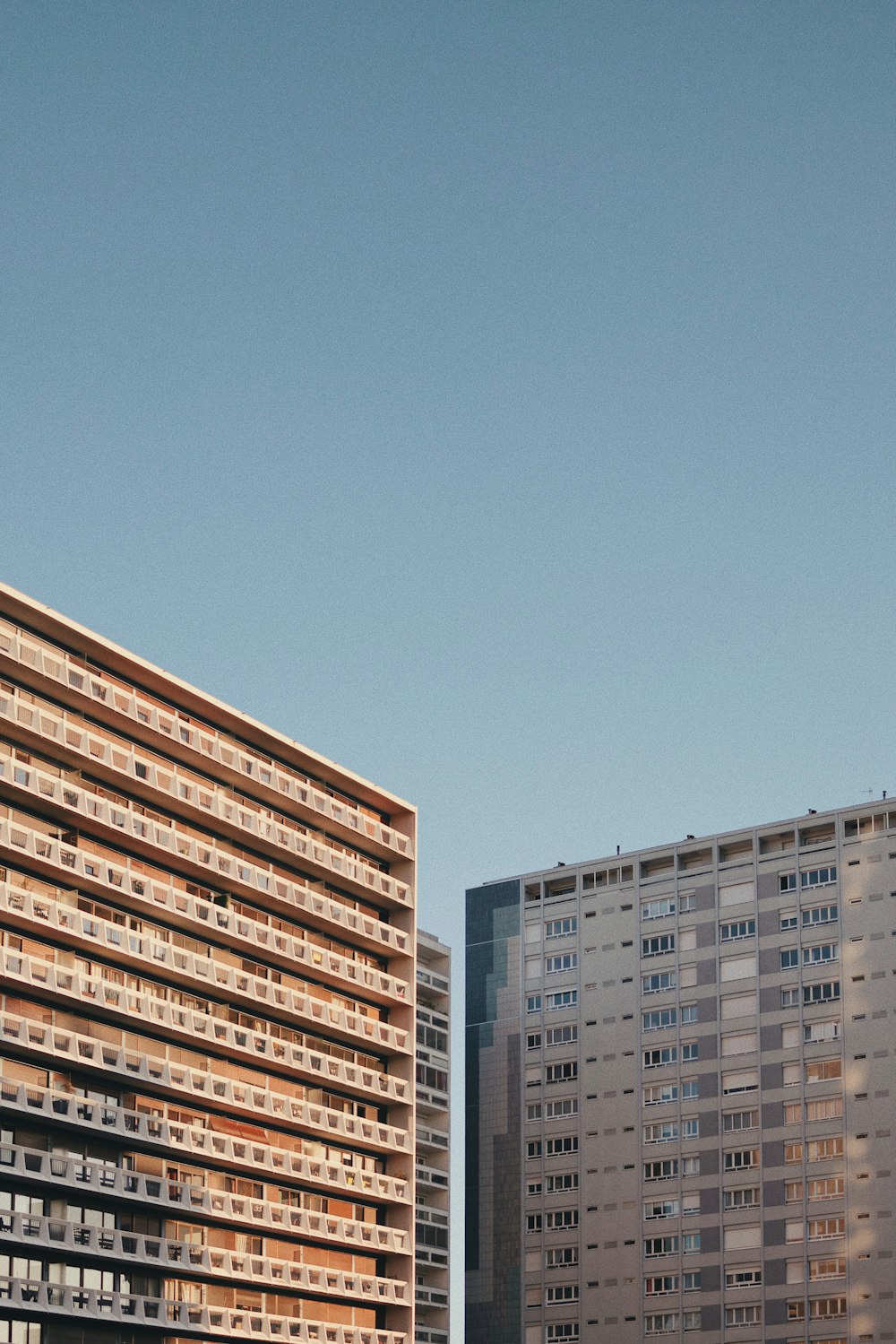 white and brown concrete building under blue sky during daytime