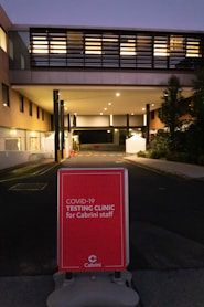 red and white signage on building
