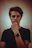 man in black crew neck shirt wearing black analog watch