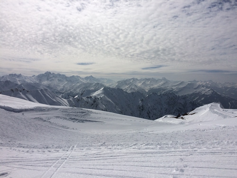 snow covered mountain under blue sky during daytime