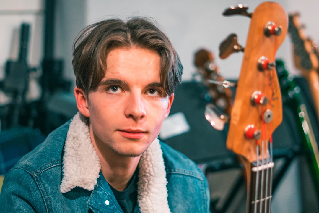 man in blue denim jacket