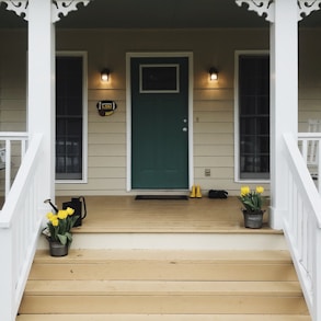 black wooden door with white wooden frame