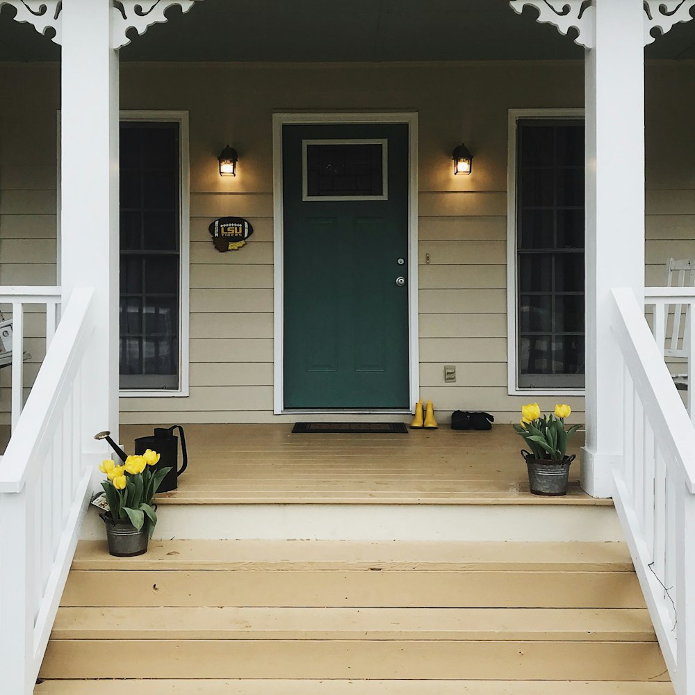 black wooden door with white wooden frame