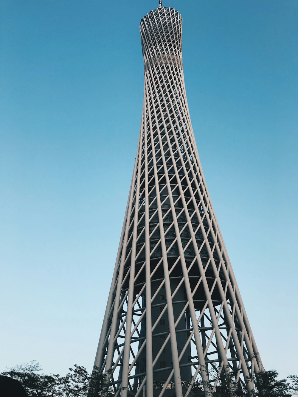 gray metal tower under blue sky during daytime