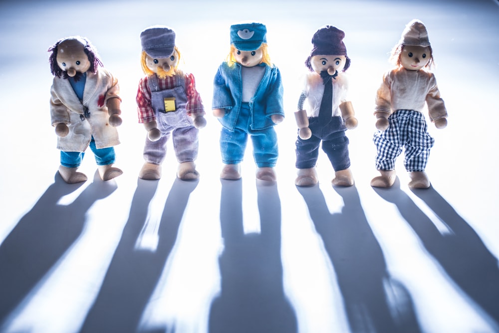 2 boy in blue and white pants and blue helmet action figure