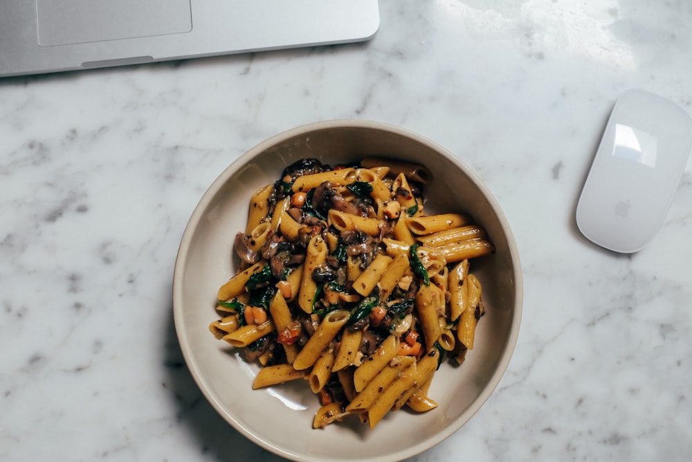 pasta dish on white ceramic bowl