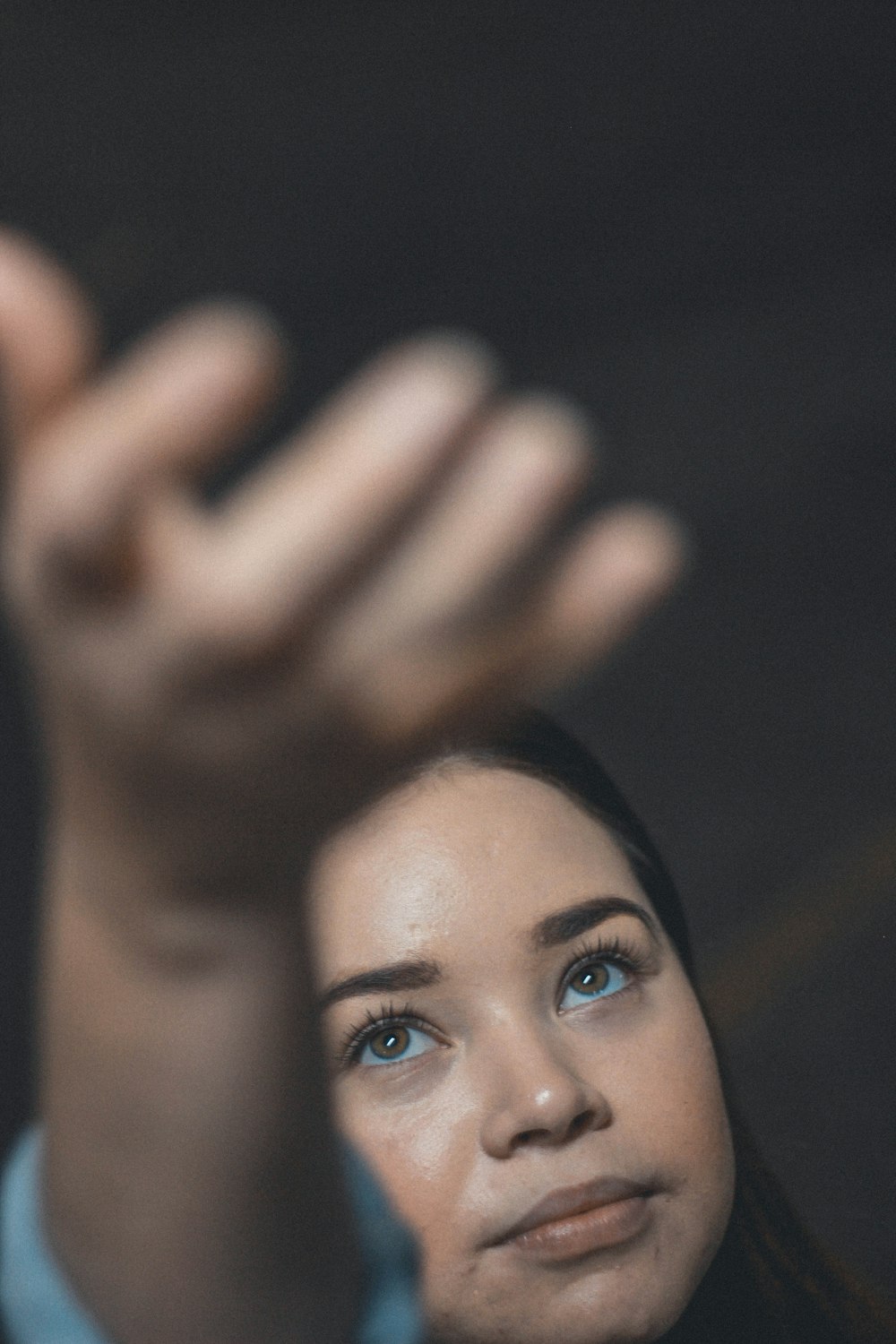 womans face with black background