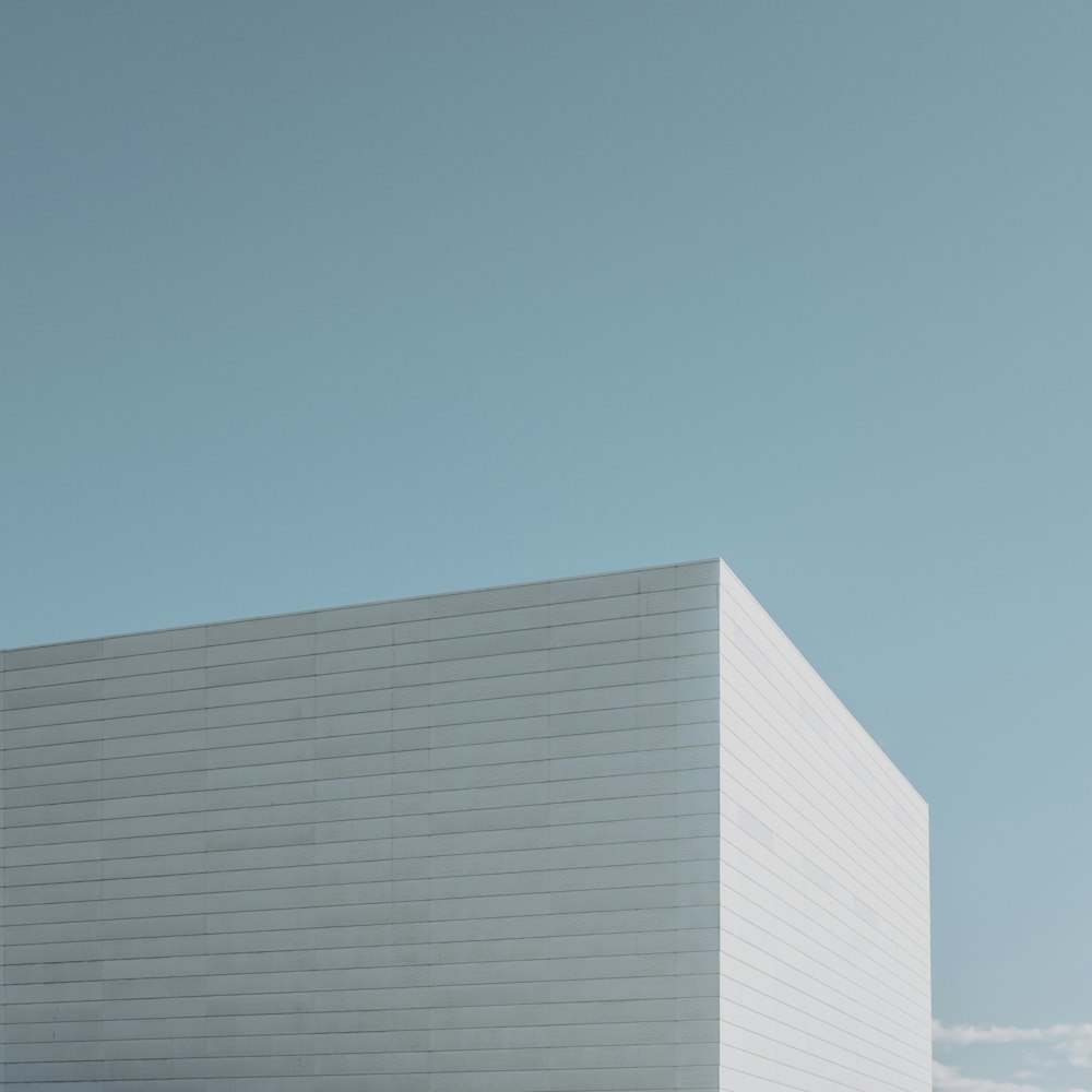 white concrete building under blue sky during daytime