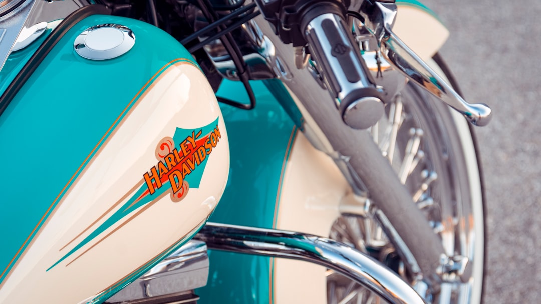 Harley Davidson retro-looking bike, teal and  and cream colors. 