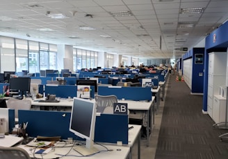 white and blue office rolling chairs