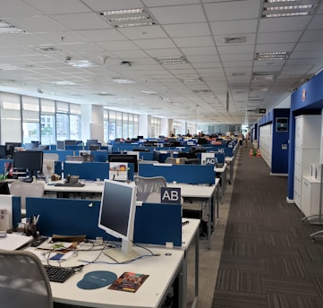 white and blue office rolling chairs