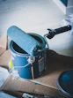 blue and white can on white table