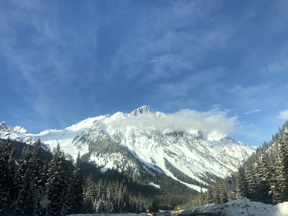 snow covered mountain under blue sky during daytime