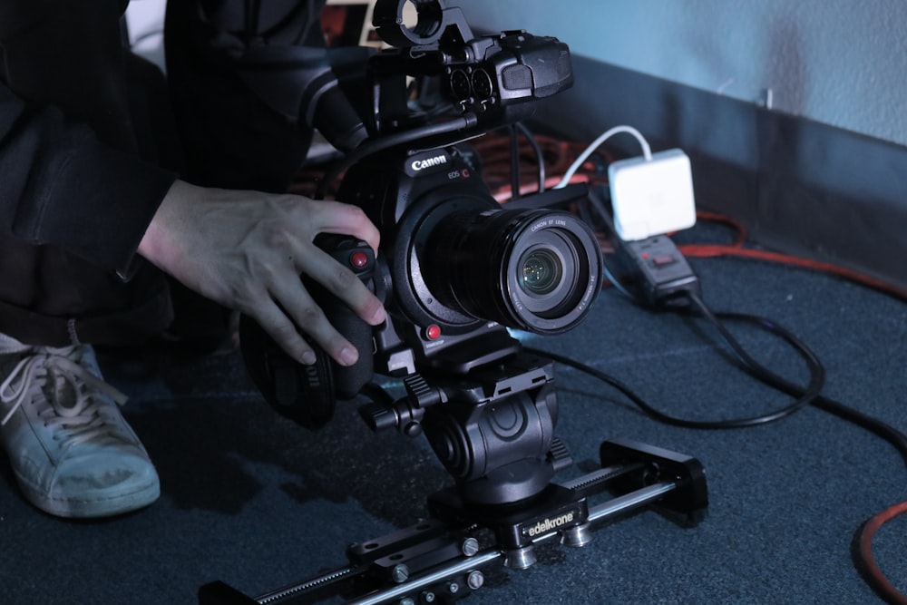 black sony dslr camera on black table