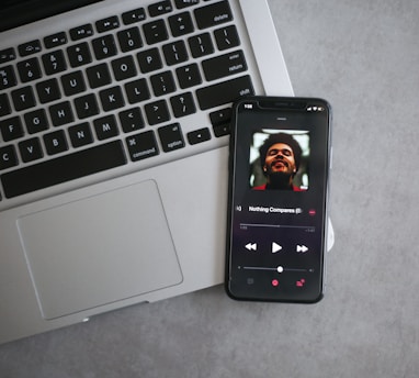 black iphone 7 on macbook pro