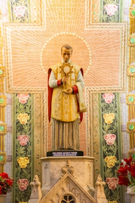 woman in red and gold dress figurine
