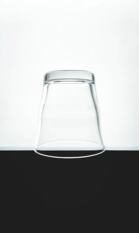 A minimalist glass plinth featuring a front-facing 'Get Price' button for easy pricing inquiries.