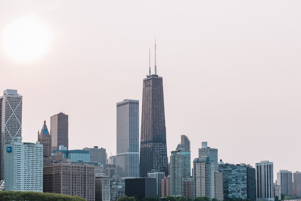 city skyline under white sky during daytime