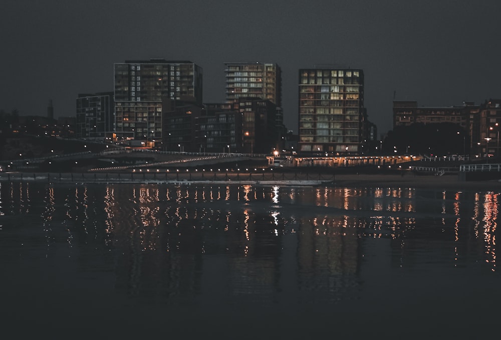 city skyline during night time