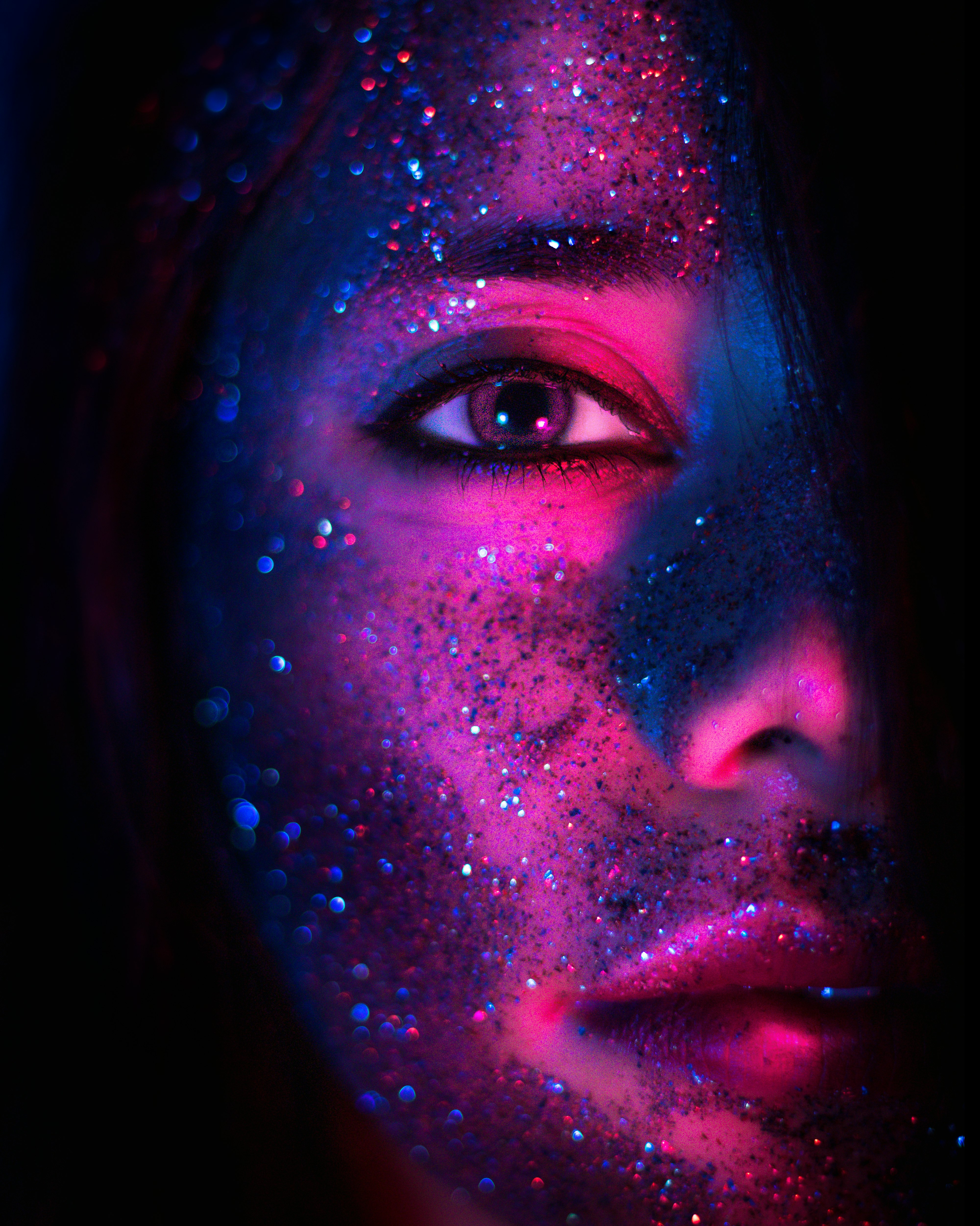 woman with blue and purple eye shadow