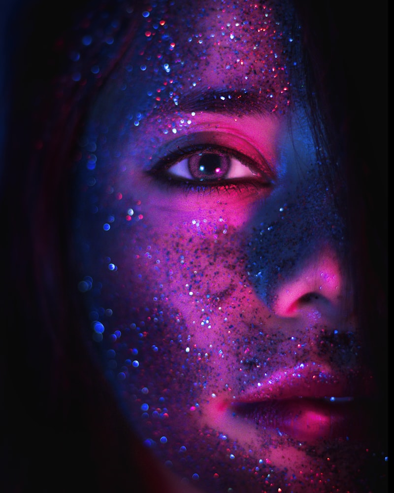 Close-up of pink and gold glitter cosmetics