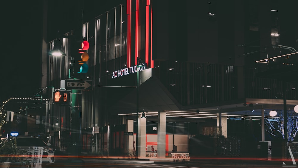 a traffic light on a city street at night