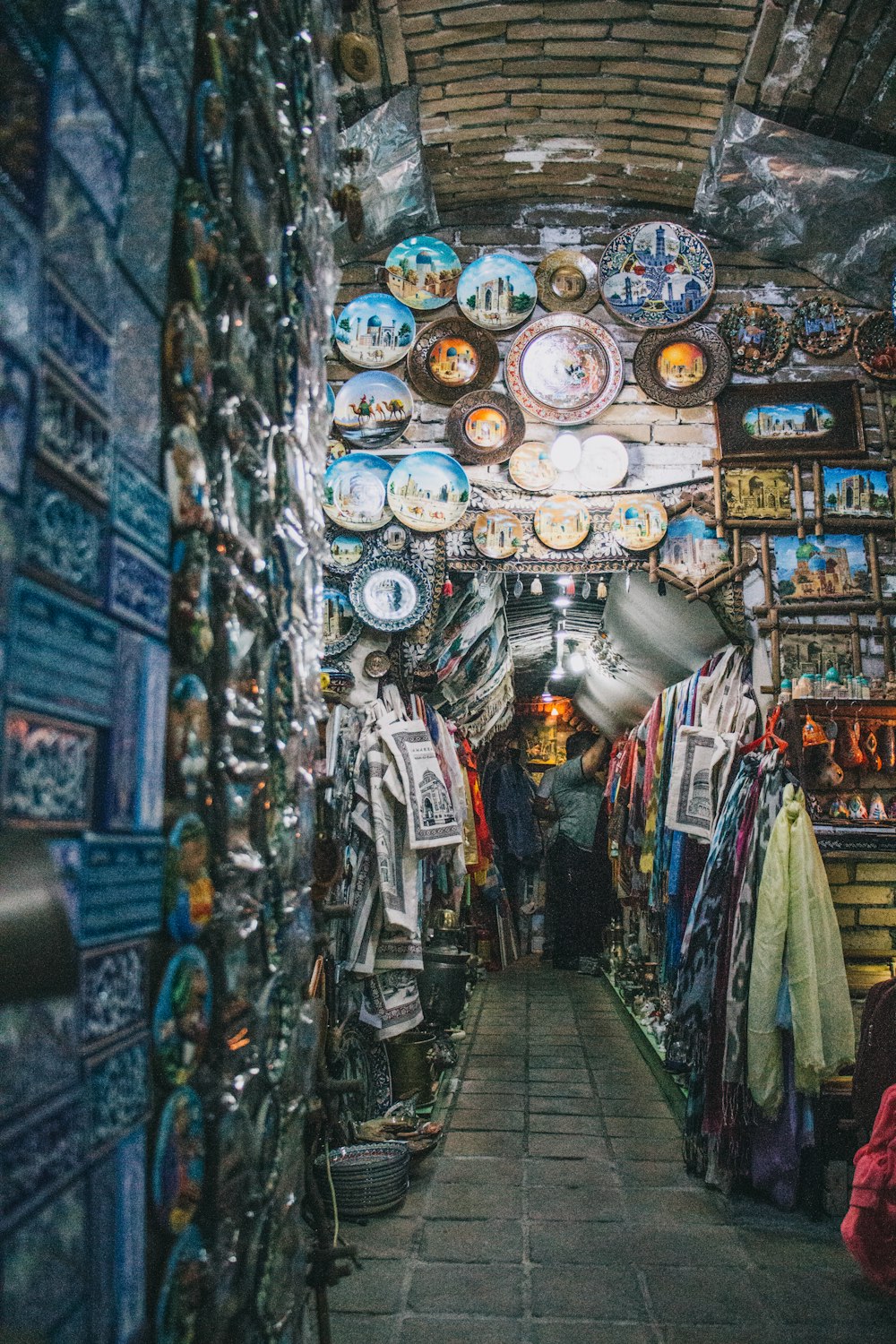 assorted clothes hanged on rack