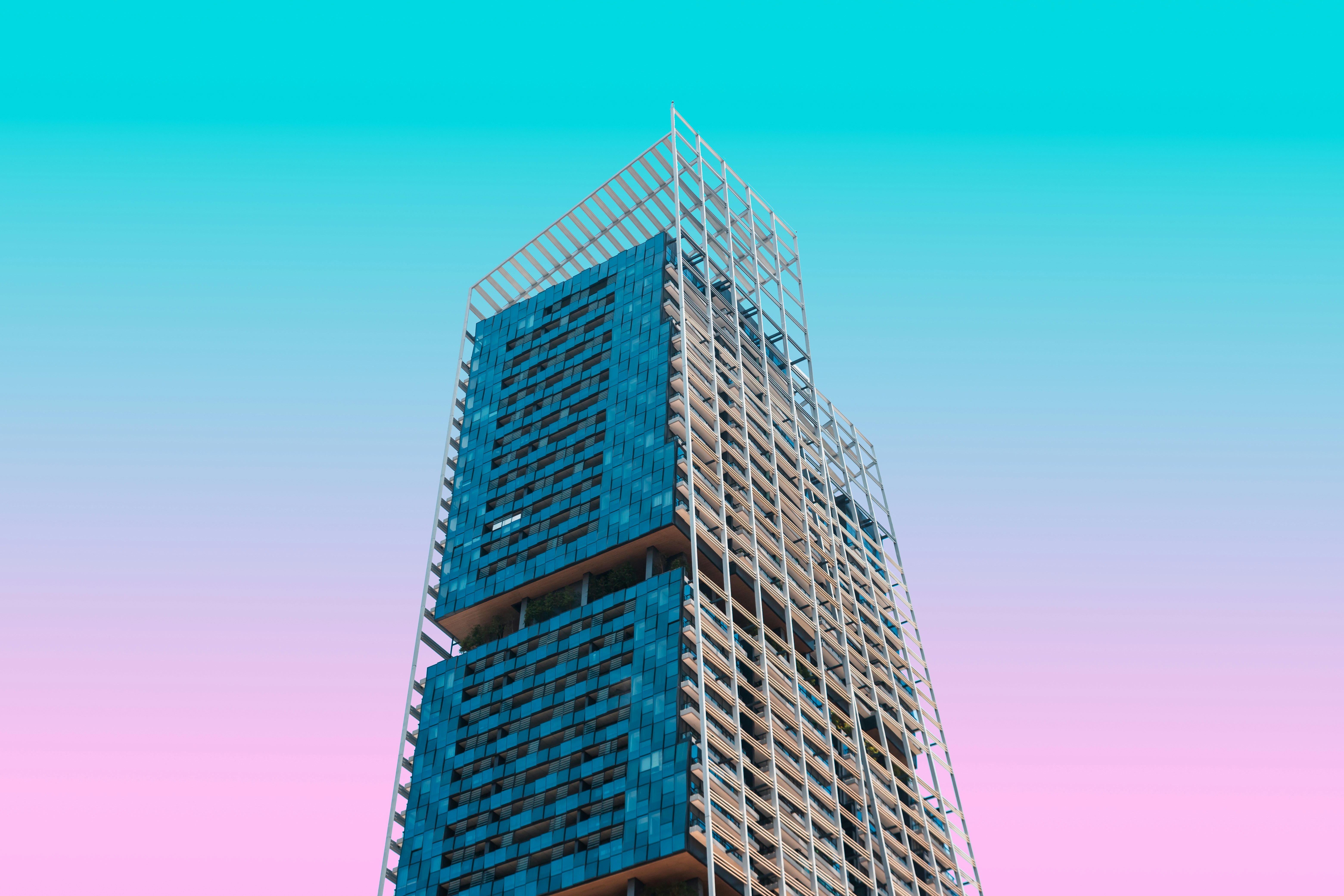 brown and gray concrete building under blue sky during daytime