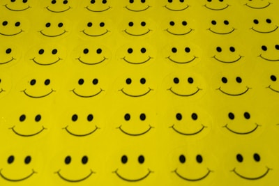 yellow and black heart print textile