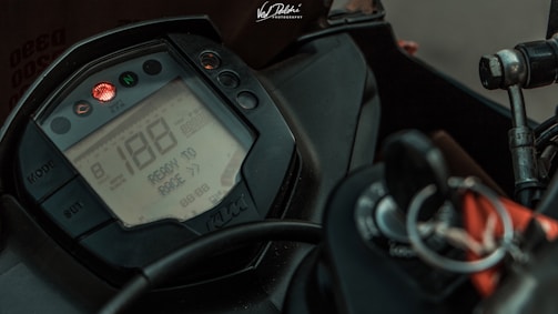 Close-up of a motorcycle dashboard with sport mode activated.